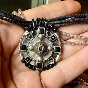 Bead and cord necklace with extender.